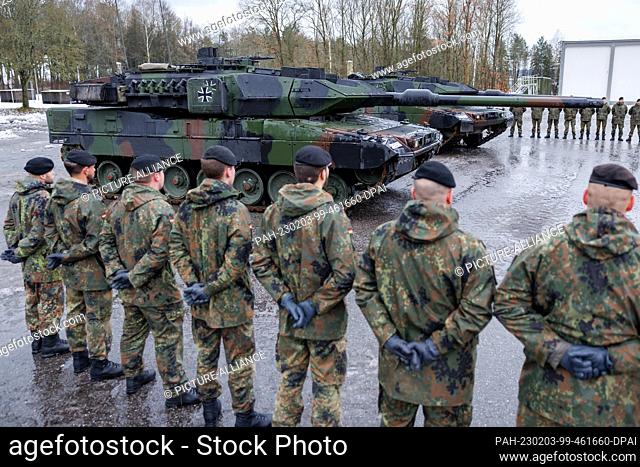 03 February 2023, Bavaria, Pfreimd: New Leopard 2 A7V tanks from the German Army stand on the barracks grounds during the ceremonial handover for Tank Battalion...