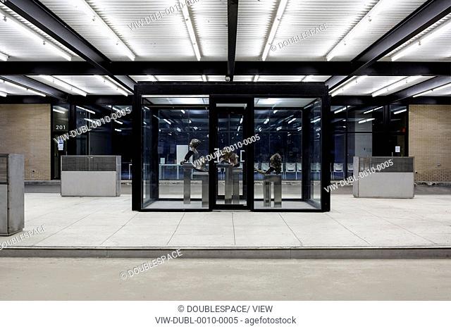 Mies van der Rohe Gas Station, Montreal, Canada. Architect: Architectes FABG, 2011. Art display case under the canopy