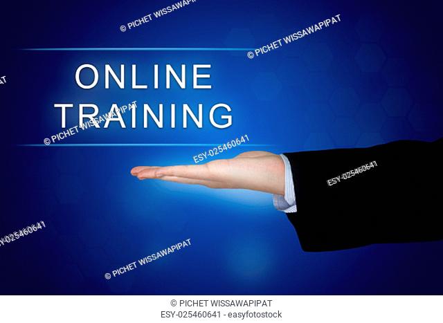 online training button with business hand on blue background