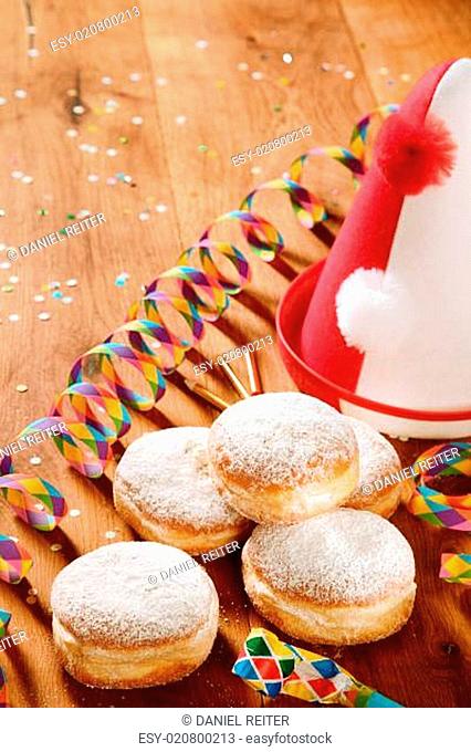 Powdered Sugar Donuts with Carnival props on Side