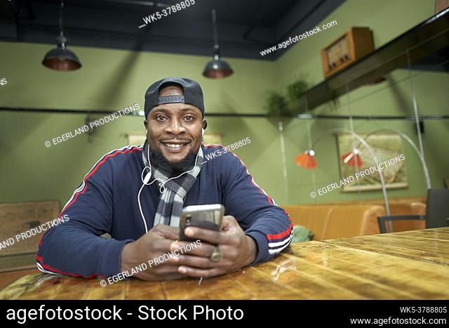 African man with smartphone