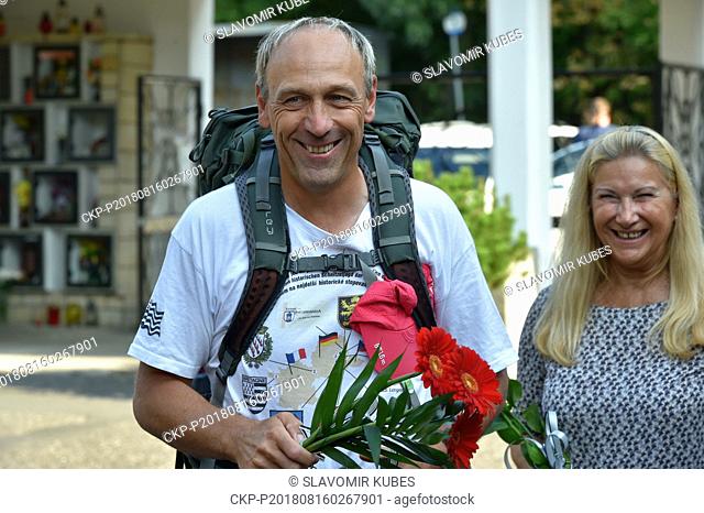 French writer Laurent Guillet (photo) walked 2, 200 kilometres to the cemetery in Litvinov, where he laid flowers and lit candles in memory of victims of the...