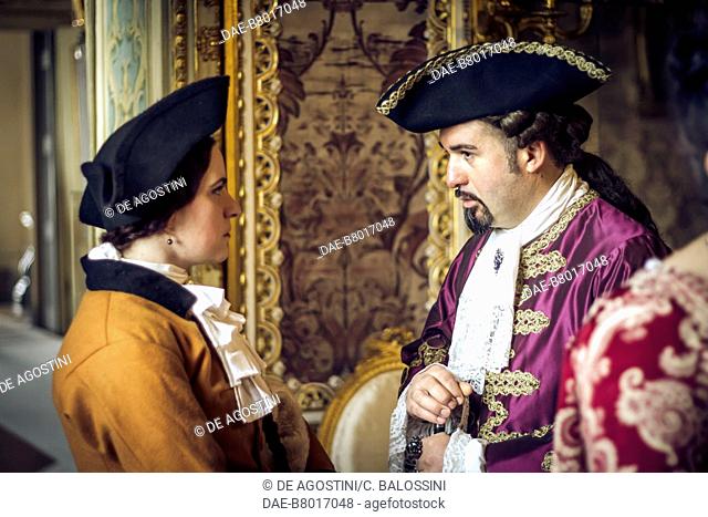 Nobleman and lady wearing tricorn hats, court life in the Stupinigi hunting lodge, Italy, 18th century. Historical re-enactment