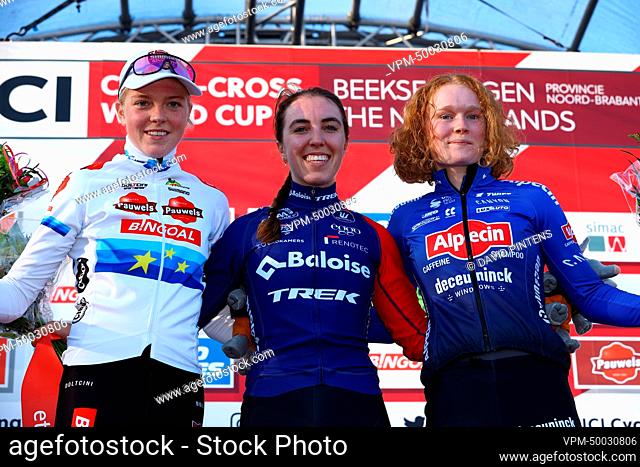 L-R, second Dutch Fem Van Empel, winner Dutch Shirin van Anrooij and third Dutch Puck Pieterse celebrate on the podium of the women elite race at the UCI...