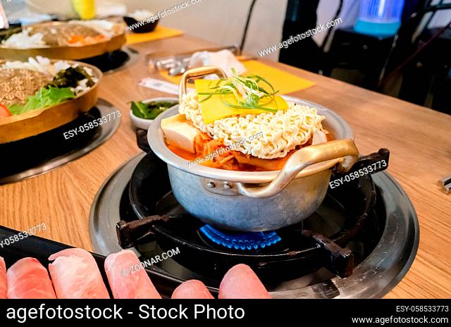 Korean food of army stew or army base stew (Budae Jjigae) in the restaurant