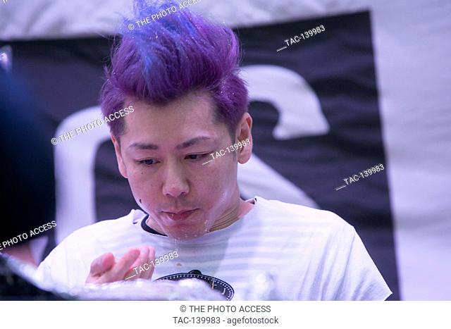 Takeru Kobayshi competes during the taco eating contest at The Sabroso Craft Beer, Taco, and Music Festival on April 8, 2017 in Dana Point, California