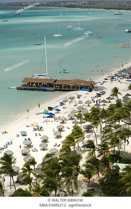 Aruba, Palm Beach, Ferienresort, palm-beach, parasols, tourists, lake, boats, overview, ABC-Inseln, little one Antilles, Dutch Antilles Caribbean island...
