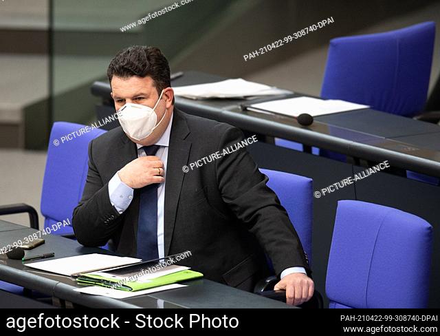 22 April 2021, Berlin: Hubertus Heil, Federal Minister of Labour and Social Affairs (SPD) sits on the government bench in the Bundestag