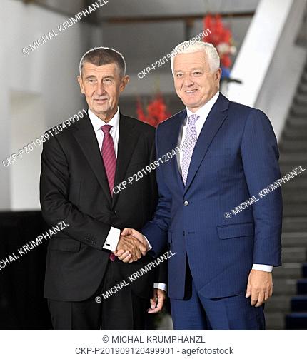 Czech Prime Minister Andrej Babis, left, handshakes with Prime Minister of Montenegro Dusko Markovic prior to meeting with PMs of Visegrad Four (V4; Czech...