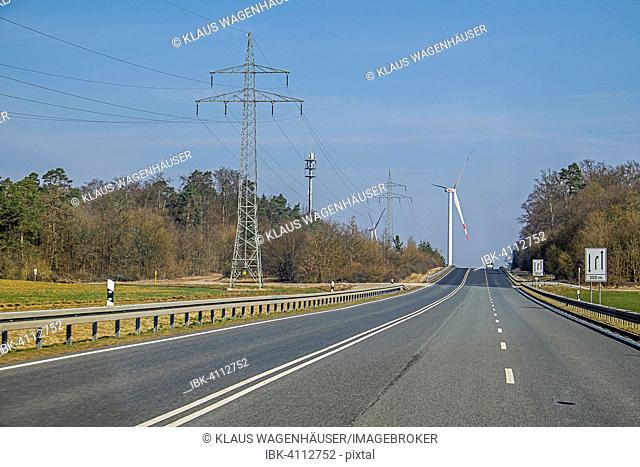 Power line, wind turbine, road, near Bad Kissingen, Bavaria, Germany