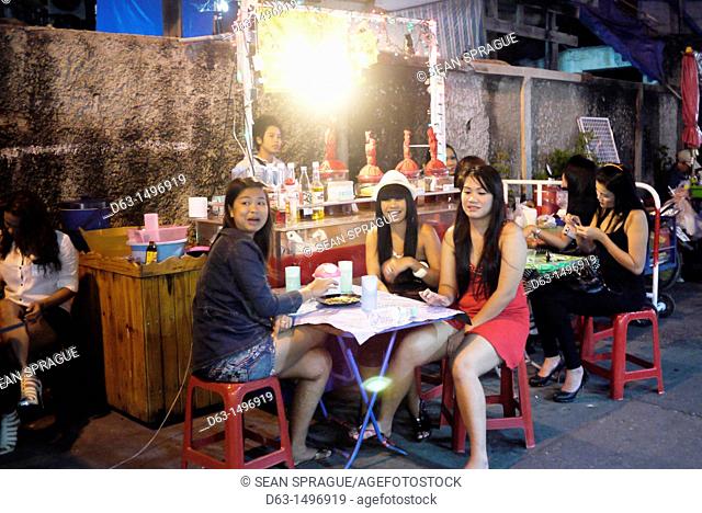 Prostitutes at an outside bar, Pattaya beach resort and centre for sex tourism, Thailand