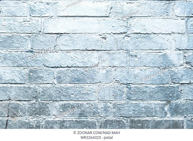 brick stone wall painted in silver - graffiti background