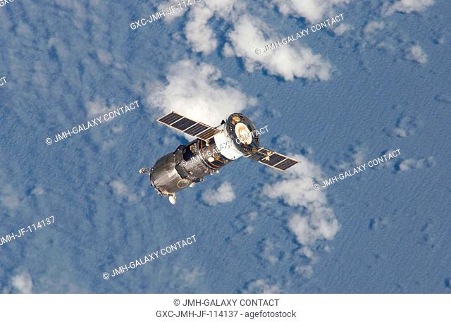 Backdropped by a blue and white Earth, an unpiloted Progress 17 supply vehicle departs from the International Space Station (ISS) at 3:16 p.m