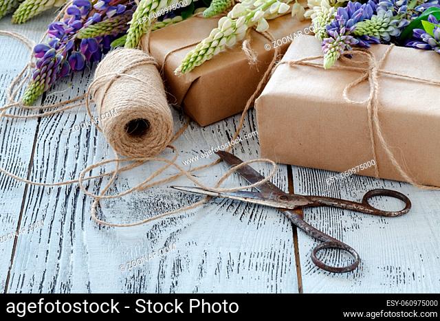 bouquet of the blue lupine flowers on a wooden table