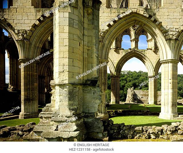 The ruined 13th century church of Rievaulx Abbey, in the Yorkshire Wolds, North Yorkshire, 1988. Rievaulx was one of the largest Cistercian monasteries in the...