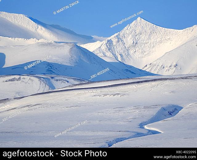 Landscape at frozen Groenfjorden, Island of Spitsbergen, part of Svalbard archipelago. Arctic region, Europe, Scandinavia, Norway, Svalbard