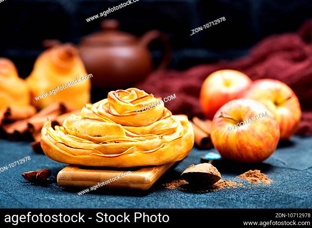 pie with apple and cinnamon on a table