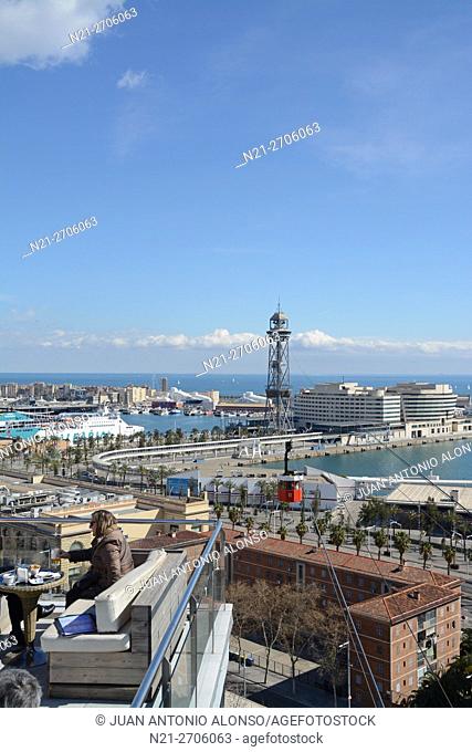 Partial view of Barcelona harbour. the Jaume I tower is in the centre and is reached by the red cable car. On the right we can see the World Trade Centre
