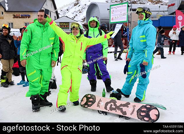 RUSSIA, KABARDINO-BALKAR REPUBLIC - DECEMBER 9, 2023: Snowboarders attend a concert marking the start of the winter season at the Elbrus ski resort