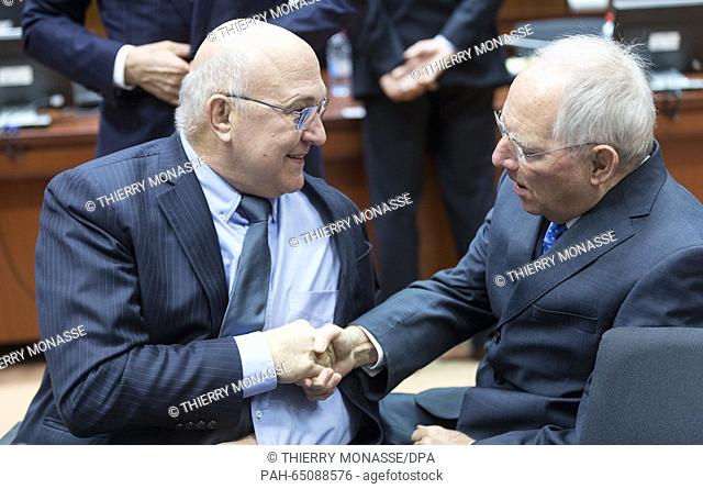 Brussels, Belgium, January 15, 2016. -- French Finance & Public Accounts Minister Michel Sapin (L) is talking with the German Finance Minister Wolfgang Schäuble...