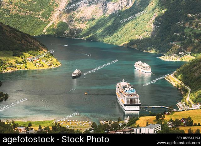 Geirangerfjord, Norway. Aerial View Of Geiranger In Geirangerfjorden In Summer Day. Touristic Ship Ferry Boat Liner Moored Near Geiranger