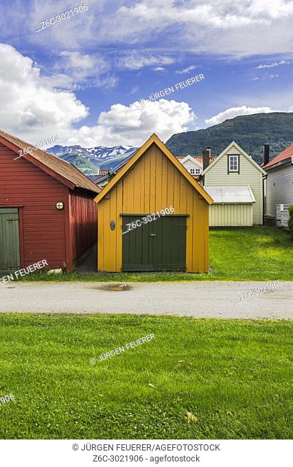 colourful boathouses and mountain view, Norway, wooden huts in Vik i Sogn, Sognefjorden