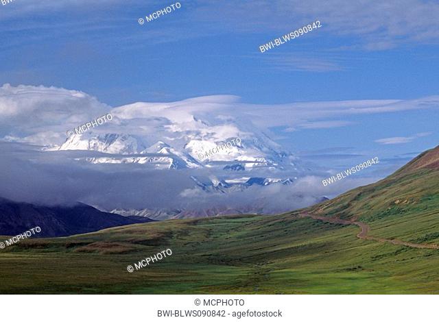 Clouds caress the peak of Mount McKinley which rises to 20, 320 feet, USA, Alaska, Denali Nationalpark