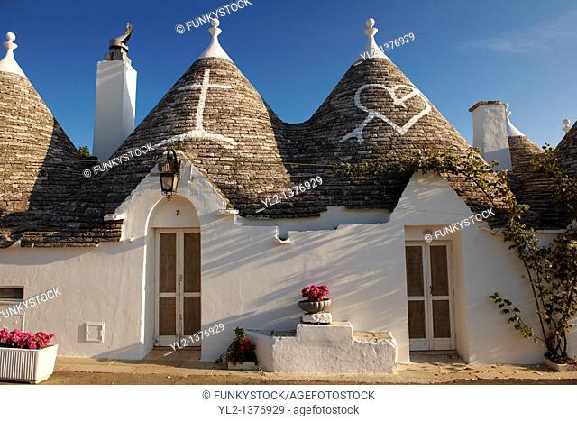 Stone Trulo house with beehive shaped conical roof, traditional Turlli houses of Alberobello, Apulia, Italy