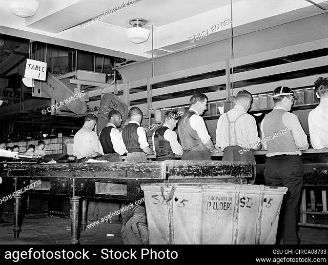 Workers sorting mail at Main Post Office, Washington, D.C., USA, Arthur Rothstein, U.S. Office of War Information, 1938