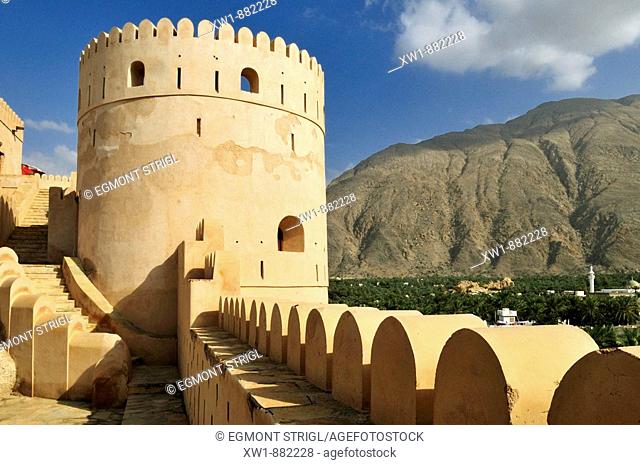 historic adobe fortification Nakhal, Nakhl Fort or Castle, Hajar al Gharbi Mountains, Batinah Region, Sultanate of Oman, Arabia, Middle East"