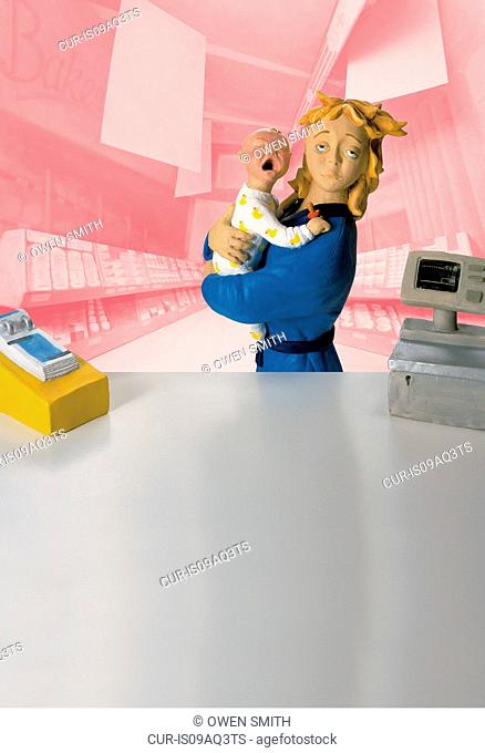 Model of mother carrying screaming baby standing in front of pharmacy counter