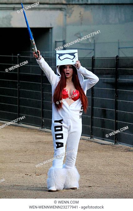 Phoebe Price poses dressed in a homemade white Yoda jumpsuit before heading to the cinema to line up for five days for the first showing of 'Star Wars - The...