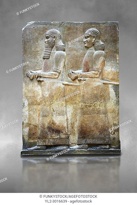 Stone relief sculptured panel of two functionaries. Room 811. Inv AO 19876 from Dur Sharrukin the palace of Assyrian king Sargon II at Khorsabad, 713-706 BC
