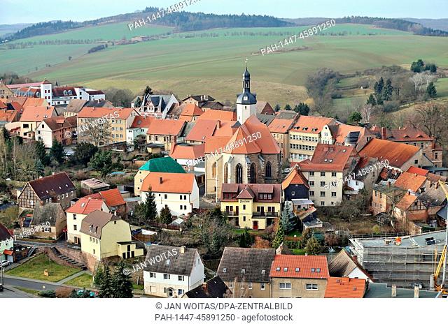 View of the small town of Mansfeld in the German state of Saxony-Anhalt with St. Georg's church (centre) and the construction site for the new museum opposite...
