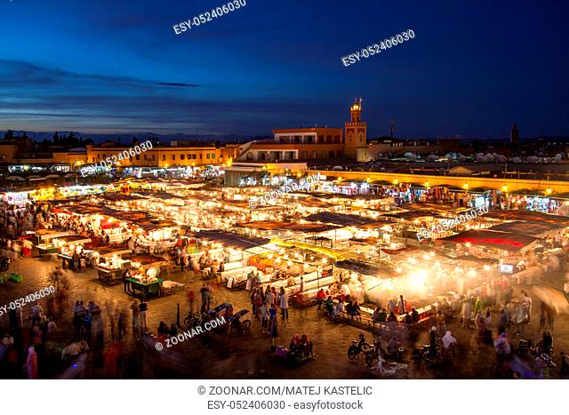 Jamaa el Fna market square at dusk, Marrakesh, Morocco, north Africa. Jemaa el-Fnaa, Djema el-Fna or Djemaa el-Fnaa is a famous square and market place in...