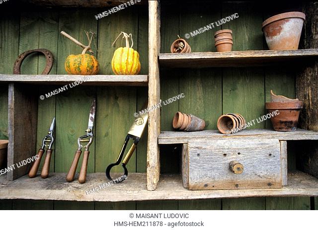 France, Indre et Loire, Montlouis sur Loire, La Bourdaisiere Castle and Hotel, gardening tools and pots on a shelf