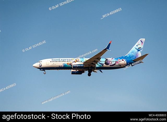 Berlin, Germany, Europe - A SunExpress Boeing 737-800 passenger aircraft with the registration TC-SNU and ""Shaun the Sheep - UFO-Alarm Farmageddon"" special...