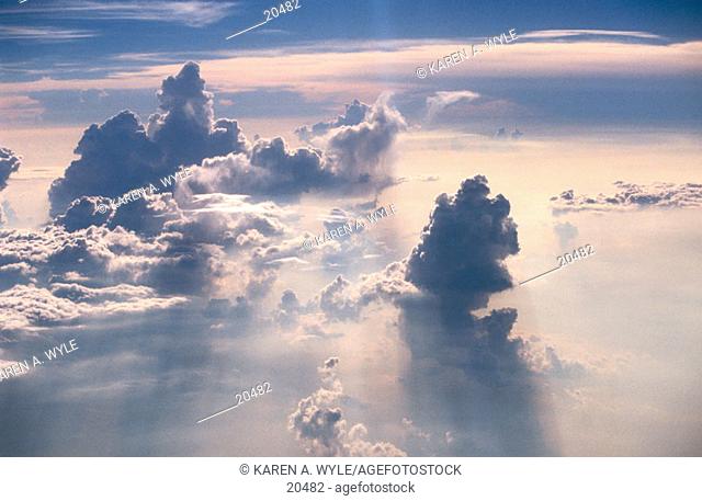 Dramatically colored and shaped clouds, seen from jet plane