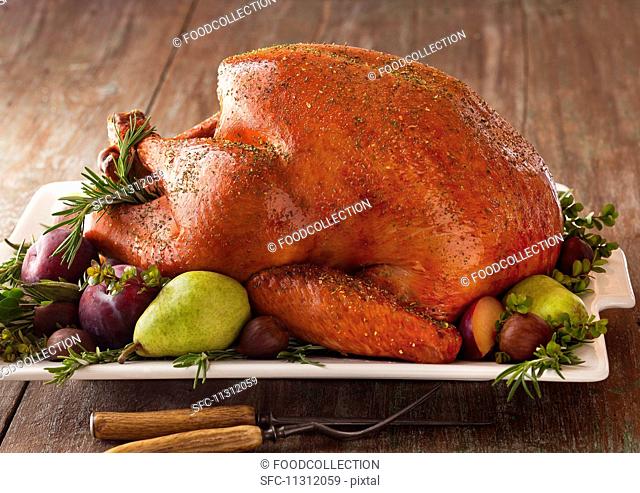 Roast turkey with fruits and herbs