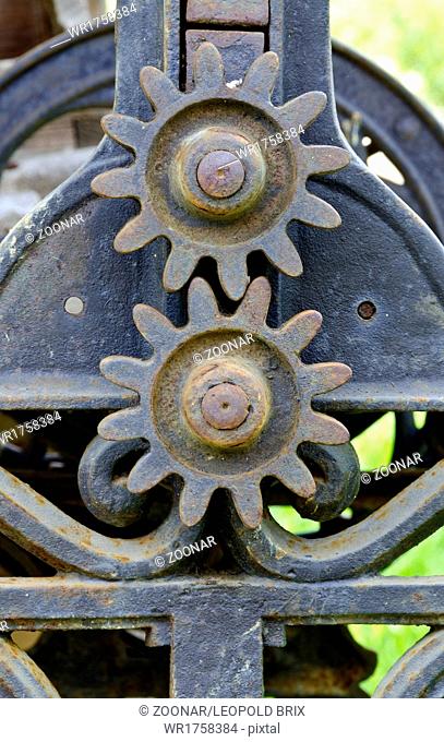 two rusty cogs