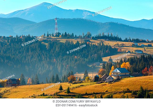 Morning Carpathian mountains and village hamlets on slopes (Yablunytsia village and pass, Ivano-Frankivsk oblast, Ukraine)