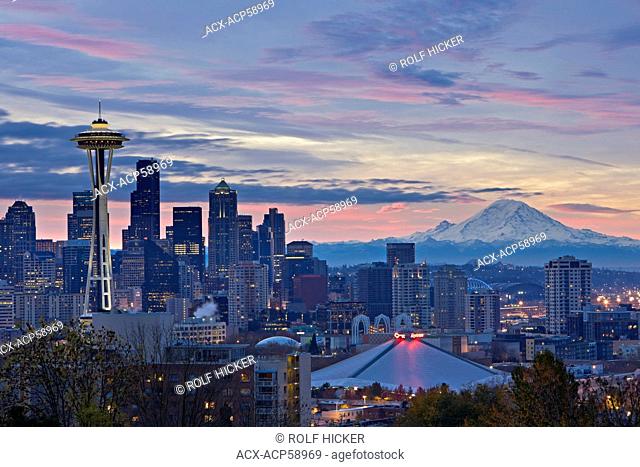Clouds during sunrise above the city of Seattle and the famous Space Needle landmark, Washington State, USA