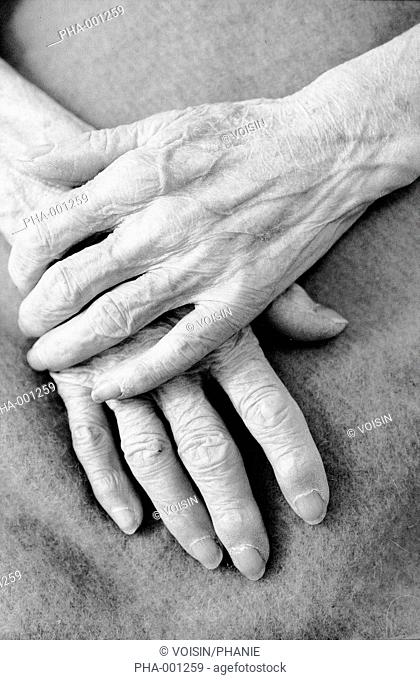 Close up of elderly person's hands