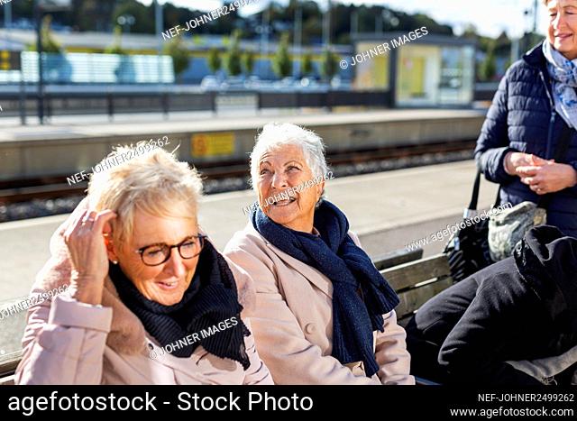 Senior women waiting at train platform