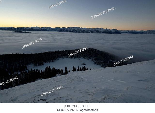 View to the Jochberg in winter above the clouds, view into the Karwendel, mountains on the Lake Walchen, Bavarian Alps, Upper Bavaria, Bavaria, Germany