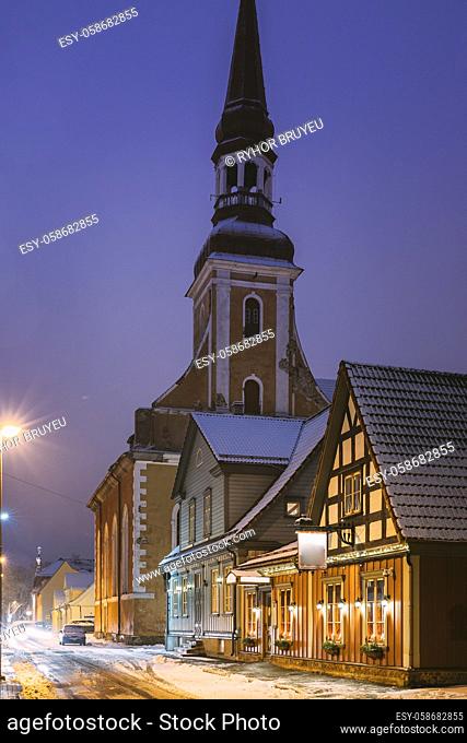 Parnu, Estonia. Night View Of Kuninga Street With Old Houses, Restaurants, Cafe, Hotels And Shops In Evening Night Illuminations
