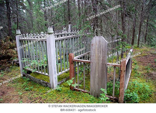 Old native burial ground, wooden gravestones, near Hootalinqua, Yukon Territory, Canada