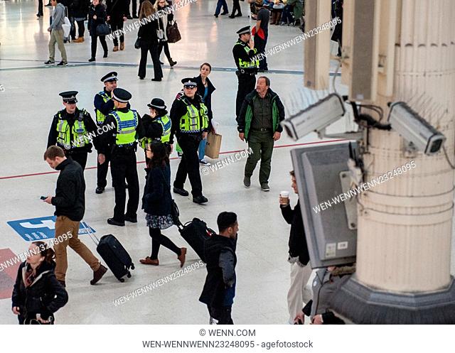 CCTV cameras in Victoria Station look on from above as the Metropolitan Police post more officers in Underground Stations following the suspected terrorist...