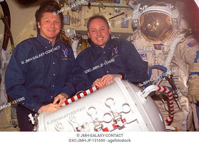 Cosmonaut Gennady I. Padalka (left), Expedition 9 commander representing Russia's Federal Space Agency, and astronaut Edward M