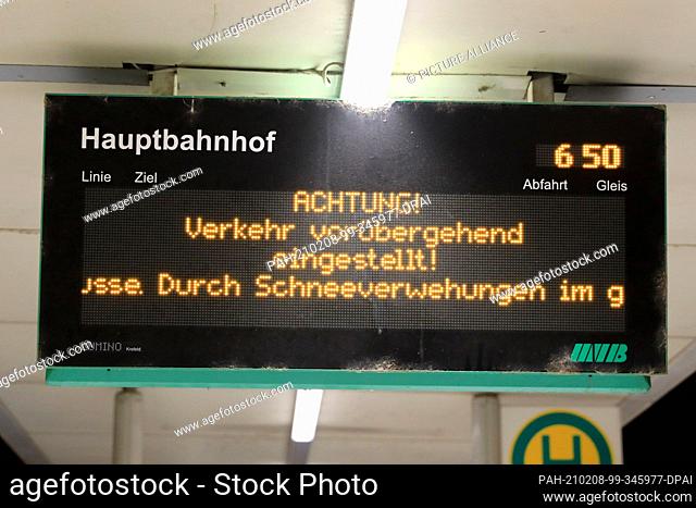 08 February 2021, Saxony-Anhalt, Magdeburg: The electronic display board of the Magdeburger Verkehrsbetriebe (MVB) at the main station shows ""Attention traffic...